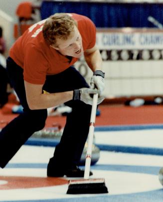 Talking a good game. When you're curling, body English helps, and so does talking the shot along. That's Canada's third John Ferguson at left, Norwegi(...)
