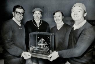 Happy winners of Canada Life Bonspiel, are, left to right, Tom Cordina, skip Ray Grant, Brian Lawrie and Eric Milne