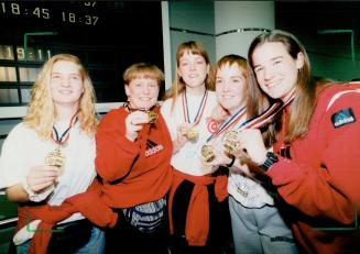(From left) Sandy Graham, Savage, Kim Gellard, Heather Crockett and Corie Beveridge arrived after winning world junior women's curling championship