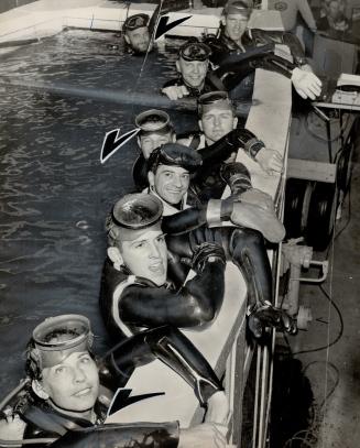 They're still in. Within one day of setting a new underwater endurance record only three divers remain in the Sportsmen's show contest. From top, ticked: Joe Mangus, Pat Morrison, Alberta Jones