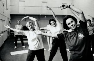 To the right... Charlotte de Neve leads a lively session during her exercise class at St. Mary's Anglican Church hall in Richmond Hill. Behind her are Barbara Bowen, left, and Jean Mckenzie, centre