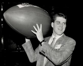 Tough to handle: St. Mary's Huskies' quarterback Chris Flynn luckily won't have to use this football on saturday when his club meets Calgary in the Va(...)