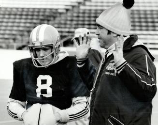 QB Dave Marler, left, with coach John Payne is under tremendous pressure in the Grey Cup final