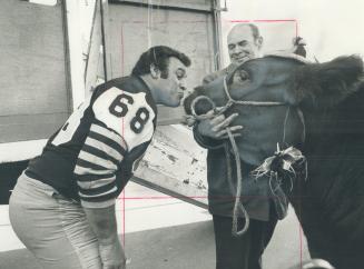 Now, that's a lot of Bull as Hamilton Tiger-Cats' Angelo Mosca discovered when he met steer named Angelo, donated to Ticats by local meat packer. Mosc(...)