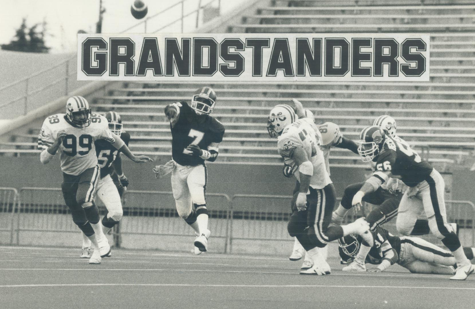 In the air: Argo quarterback Condredge Holloway fires a pass in last night's game, as Concordes' Steve Raquet rushes out to try for it, trailed by Argo Jeff Inglis
