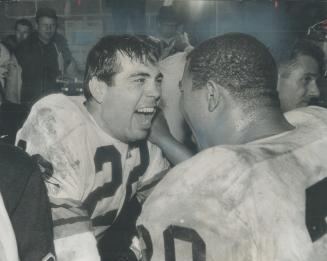Grey cup heroes whoop it up in Lions' dressing-room after victory
