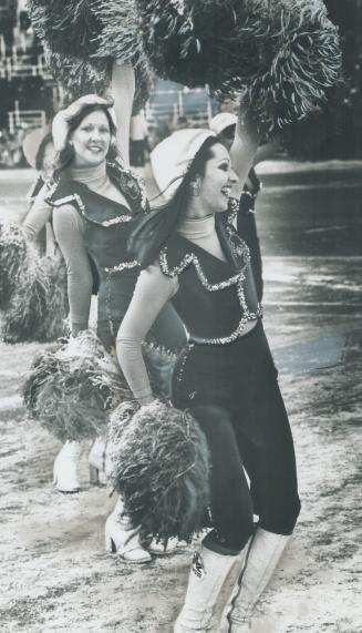 Edmonton cheerleaders are all smiles before the game starts