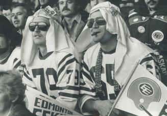 Eskimo fans, dressed as blue-eyed Arabs with $100 bills to spare, were sitting in the same section as Alberta Premier Peter Lougheed