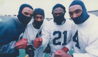 Cold Comfort: Bundling up for first practice in Hamilton, from left: Jimmy Cunningham, Adrion Smith, George Nimako, Ed Berry