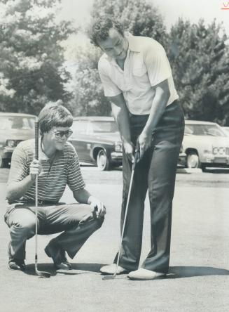 Newcomers to professional Golf, Skip Dunaway (left), 25, of Charlotte, N