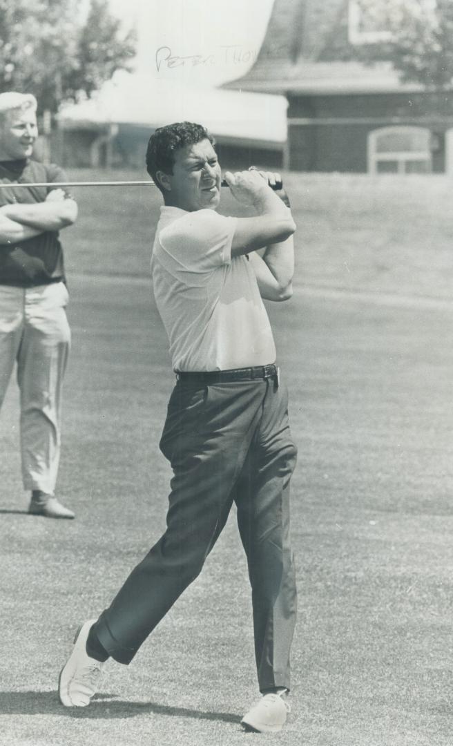 Peter Thomson. Takes a fairway shot