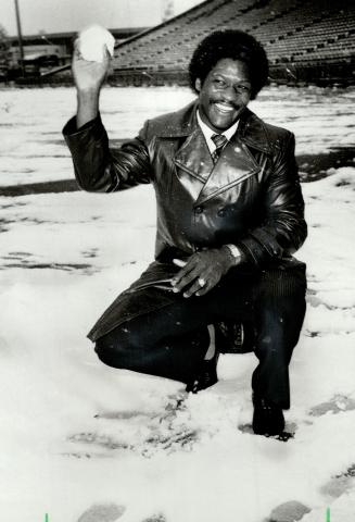 Out in the cold: James Sykes, bitter over his treatment in Calgary, tosses a snowball at Exhibition Stadium yesterday after the Bombers arrived for today's game with the Argos