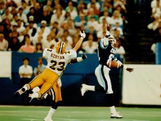 No Marriott Magic: Argos wideout Randy Marriott couldn't corral this Matt Dunigan pass during the early going last night, as Eskimos defensive back Mark Norman stretched out to break up the play