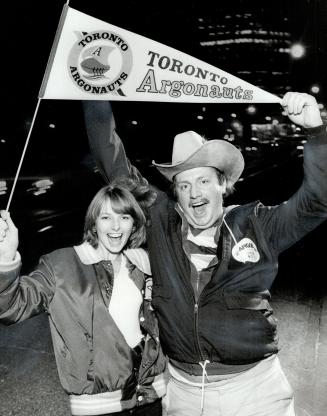 Winning the west? Bill Tomlinson and is siter-in-law Val Overwater may be from the wild west-actually, they're Winnipeggers - but they're Argonaut fan(...)