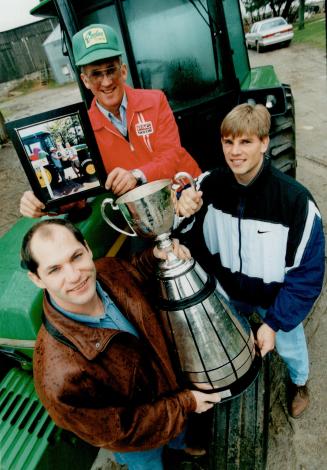 Harvest of championships. Championship roads lead to Al McMaster's Sixth Line farm. Neighbor Jeff Fairholm, left, and Duane Dmytryshyn of Argos Brough(...)