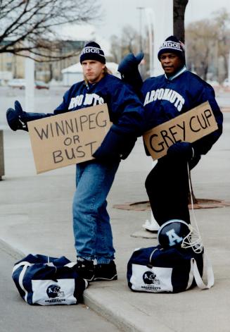 Grey Cup Bound: Argo defensive ends Mike Campbell (left) and Brian Warren claim they are all set to take on the Calgary Stampeders in the cold confines of Winnipeg Stadium on Sunday afternoon