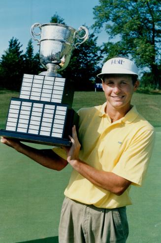 Franklin's best, Barr none. Vancouver golfer Brent Franklin holds the CPGA Championship trophy aloft ater shocking the favorite, Dave Barr, in a final-round showdown