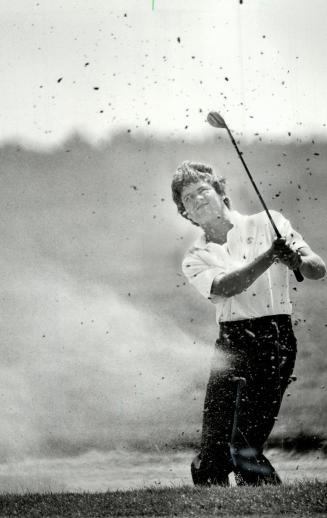Sand blaster! Robert Killeen of London gets a sand shower yesterday in The Star-sponsored Ontario Amateur Golf Championship. Killeen shot a 75