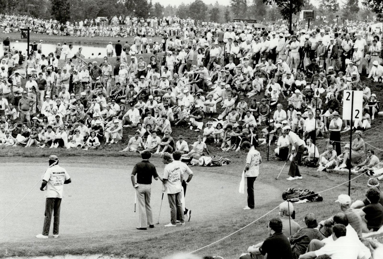 Space was limited at most of the holes as a sea of people gathered to watch the golfers