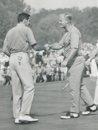 Who says Jack Nicklaus doesn't communicate? Nicklaus has a wide congratulatory smile for New Zealander Bob Charles on 18th green of St. George's, seco(...)