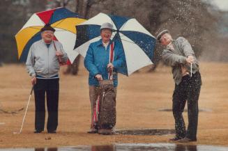 While skiers may boo, golfers like Reggie Jackson, 67, right, and his pals find it's a great winter
