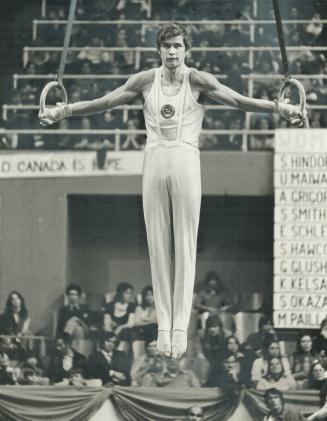 Just hanging out, Gymnast Alexander Ditiatin of Soviet Union won men's over-all championship at last night's competition at Maple Leaf Gardens. His ma(...)