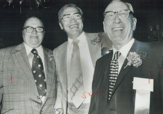 Three leafs in the hall of fame, Gordie Drillon, George Armstrong and Ace Bailey (left to right) wear smiles that indicate what it's like to make it to Hockey Hall of Fame