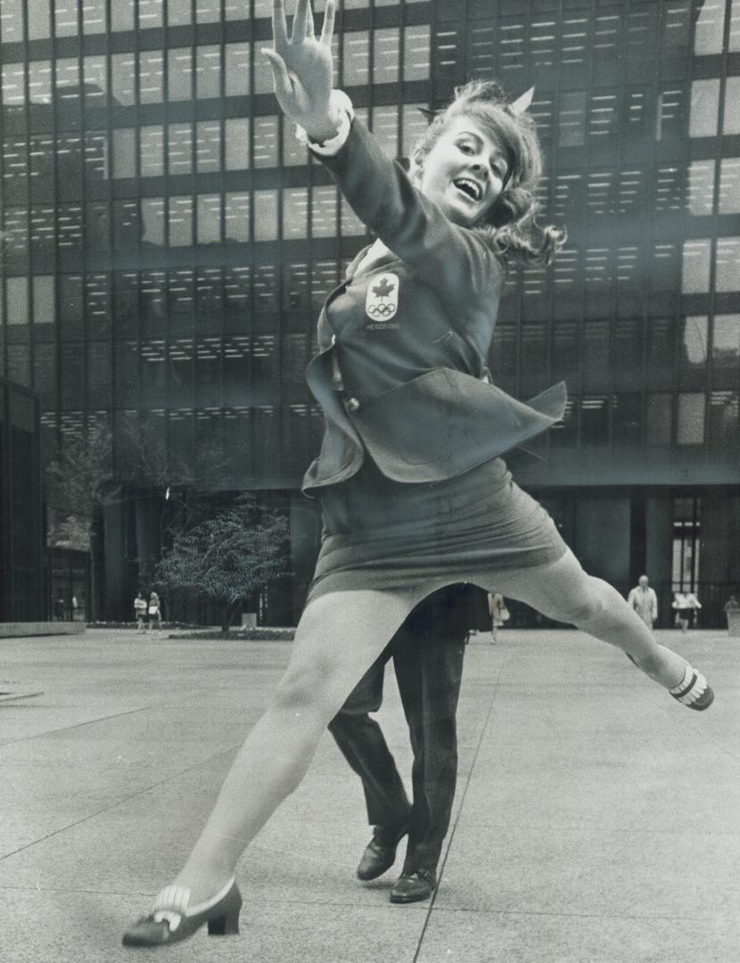 Warm-up leap is taken by Olympic gymnast Marilyn Minaker, one of the leaders of the Miles for Morals walkathon from Bayview and Sheppard to Varsity St(...)
