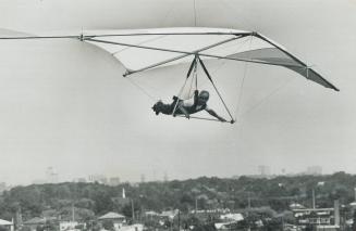 Hang-glider pilot John Bremner of Mississauga soars from Etobicoke's Centennial Park hill