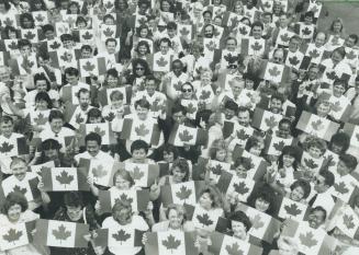 Showing the Flag, Employees of Zurich Canada insurance group find a colorful and patriotic way to show their support for Team Canada, which begins its(...)