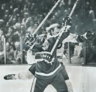Dave (Tiger) Williams of the Maple Leafs battles with a Philadelphia Flyer during the quarter-final series