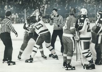 Players battle it out during Toronto-Detroit game March 21