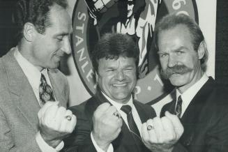Terrific trio: Former defensive specialist Bob Galney, left, and goal-scorers Marcel Dionne and Lanny McDonald show off their new rings yesterday