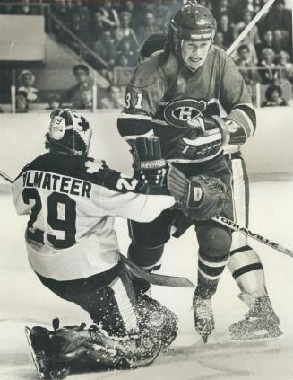 Habs' Mark Napier crashes through Palmateer's crease