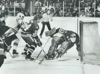 Big M Frustrated . . . Again: Frank Mahovlich's best chance at goal No. 600 came on this play when puck stopped inches from going over line behind Hou(...)