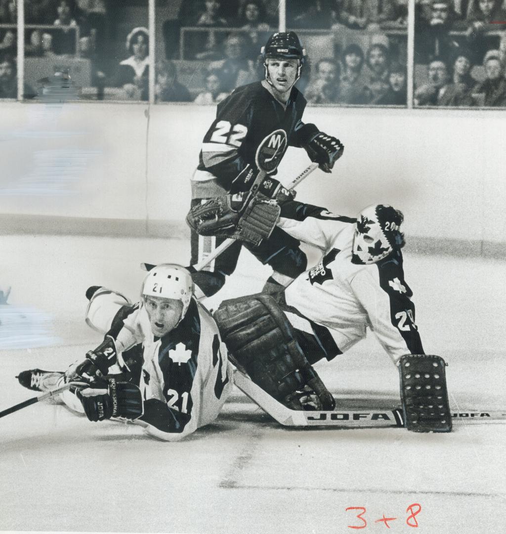 Borje Salming (21) and Mike Palmateer (29) will have to deal with 20-goal scorer Mike Bossy