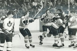 The Victors and vanquished, Two pictures by Star photographer Doug Griffin tell it all in last night's Stanley Cup playoff game at Gardens as jubilant(...)