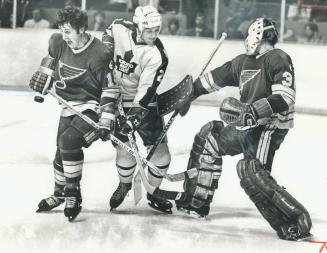 Fingertip Control? St. Louis Blues' defenceman Rod Seiling has his hands full last night against Maple Leafs. He has Dave (Tiger) Williams to contend (...)
