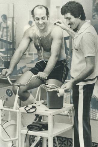Riding to the rink. National Hockey League linesman John D'Amico takes fitness test at Skyline Health Club where NHL officials have been undergoing ev(...)