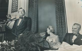 Honor foe of death penalty. Toronto lawyer Arthur Maloney, former PC Member of Parliament for Parkdale, speaks at testimonial dinner held for him Satu(...)
