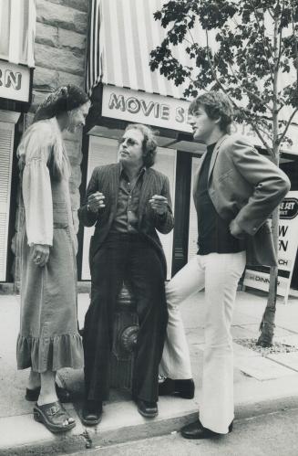 Film Director, Murray Markowitz, talks with actors Andrew Skidd and Michele Fansett