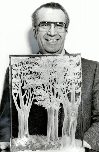 Crystal beauty: Joe Markovic, who hopes to open a gallery in North York to display his glass-art collection, displays a piece called The Forest, which weighs 80 pounds
