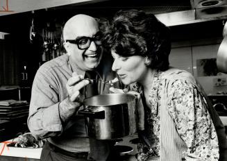 Vancouver soprano Heather Thomson samples Iranian dish made by Lotfi Mansouri, general director of teh Canadian Opera Company. Strangers expect our cu(...)