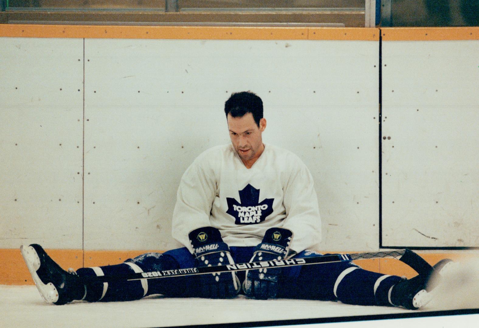 Down in the dumps: Veteran defenceman Brad Marsh takes a break during yesterday's Leaf practice at the Gardens, perhaps contemplating why coach Tom Watt has used him so infrequently of late