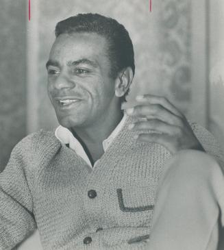 Johnny Mathis doesn't have dynamic stage presence, says critic William Dampier, although his voice is still powerful and well-disciplined on romantic ballads
