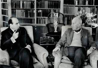 Peter C. Newman (left) interviews Vincent Massey. Massey finds English words to 'O Canada' unworthy