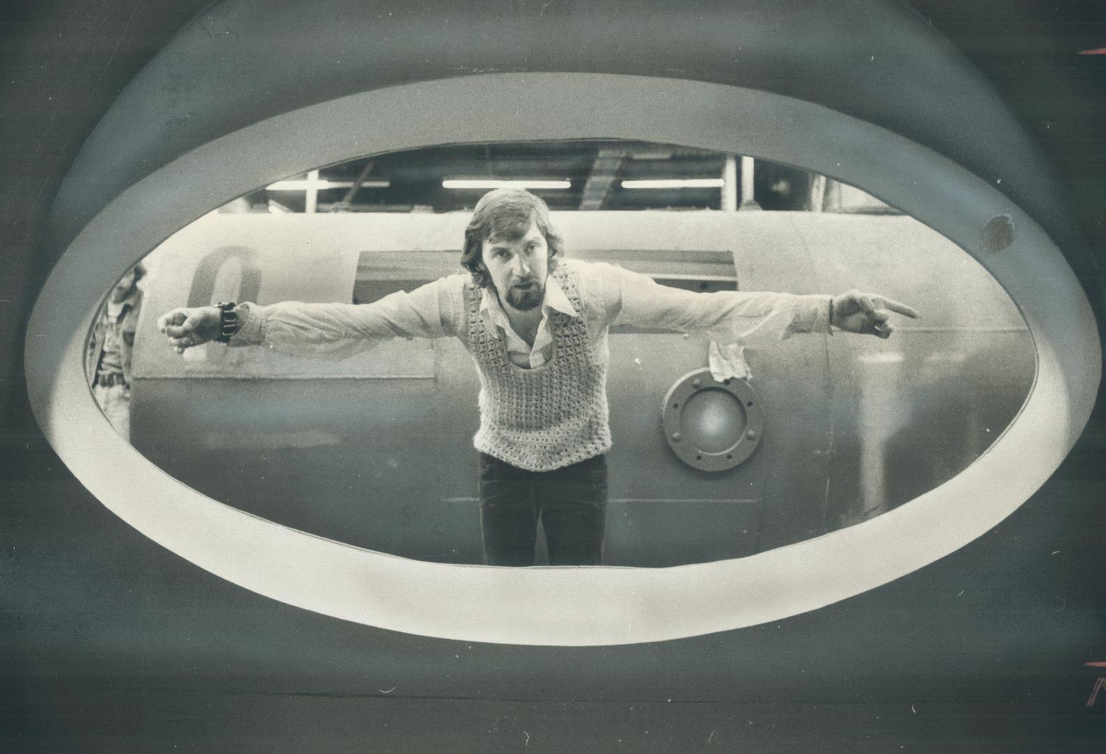 The Brains behind the most technically complex movie sets ever made in Canada, Toronto designer Jack McAdam looks through the front of submarine mock (...)