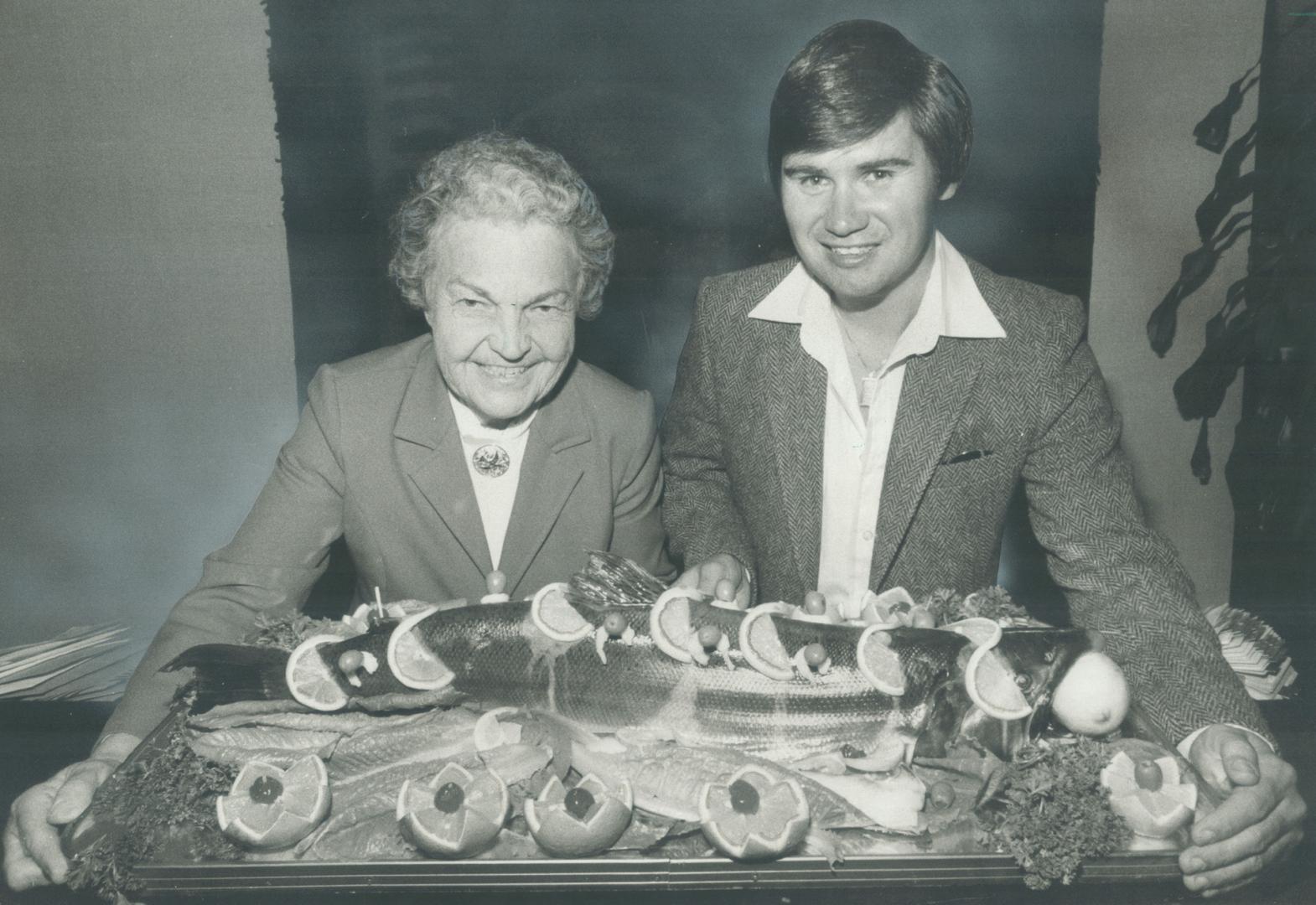 A good catch. A fisherman herself, Mayor Hazel McCallion admires 15-pound coho salmon Councillor Larry Taylor, seen with her, caught outside Port Cred(...)