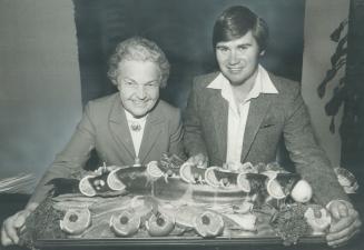 A good catch. A fisherman herself, Mayor Hazel McCallion admires 15-pound coho salmon Councillor Larry Taylor, seen with her, caught outside Port Cred(...)