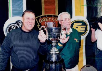 Matthews, left and Lancaster and Ren Lancaster with Grey Cup